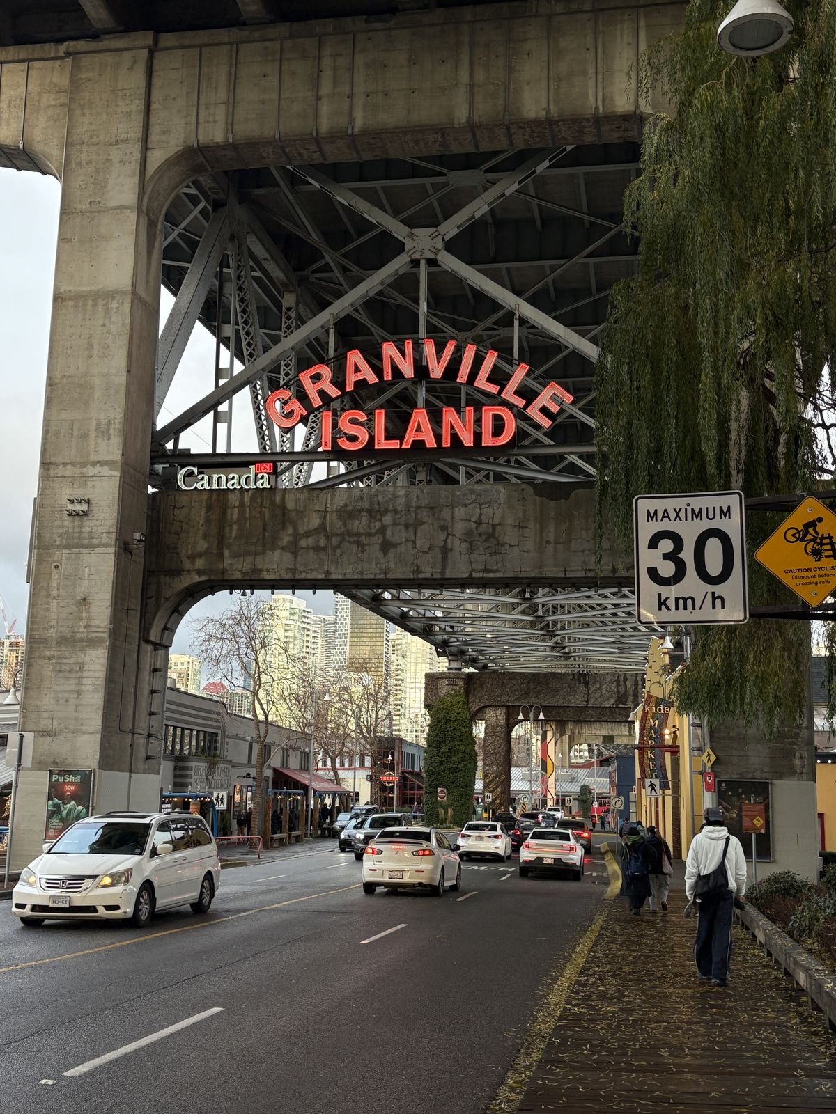 False Creek seawall, waterfront paths, and skyline views