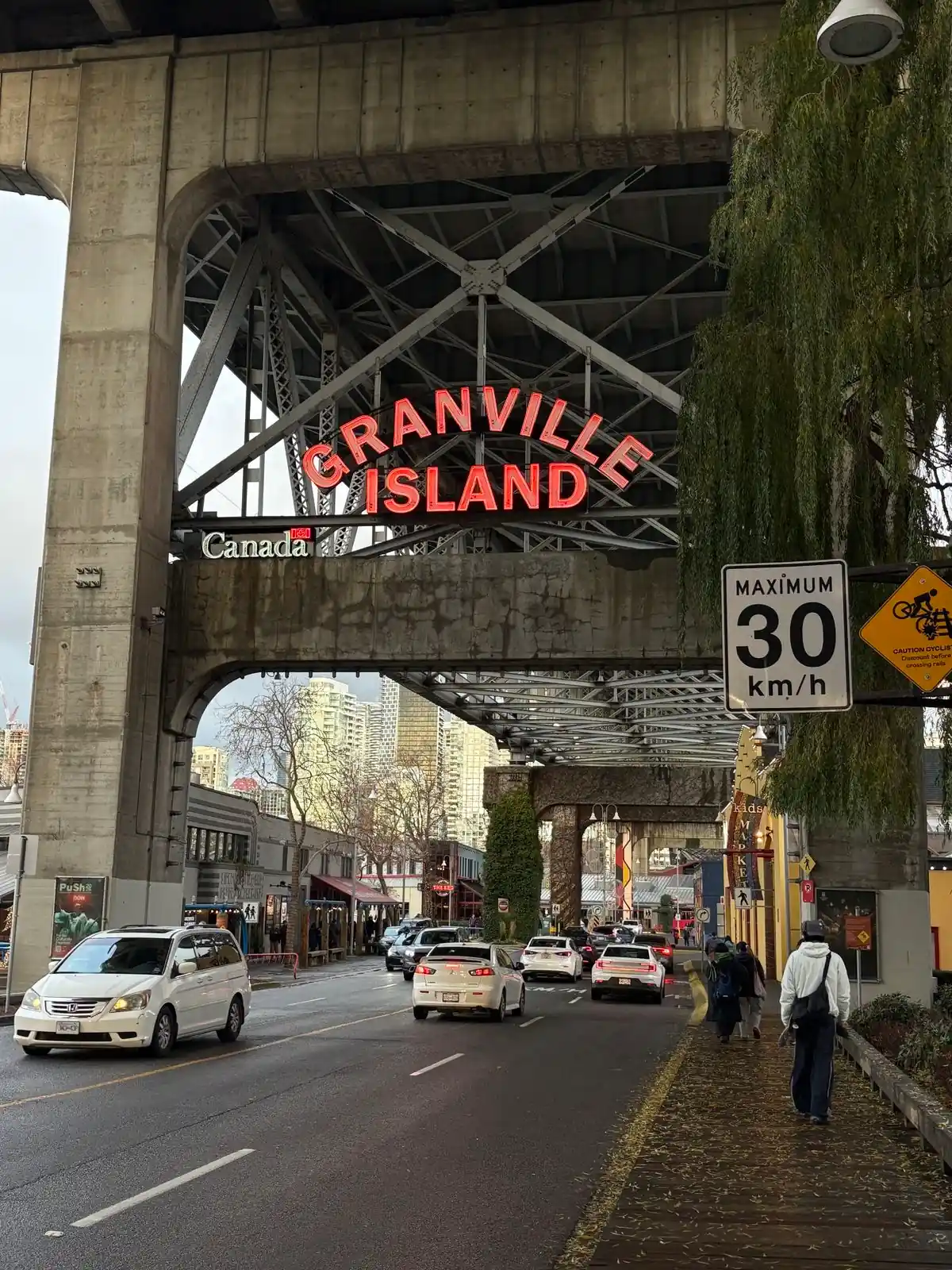 False Creek seawall, waterfront paths, and skyline views