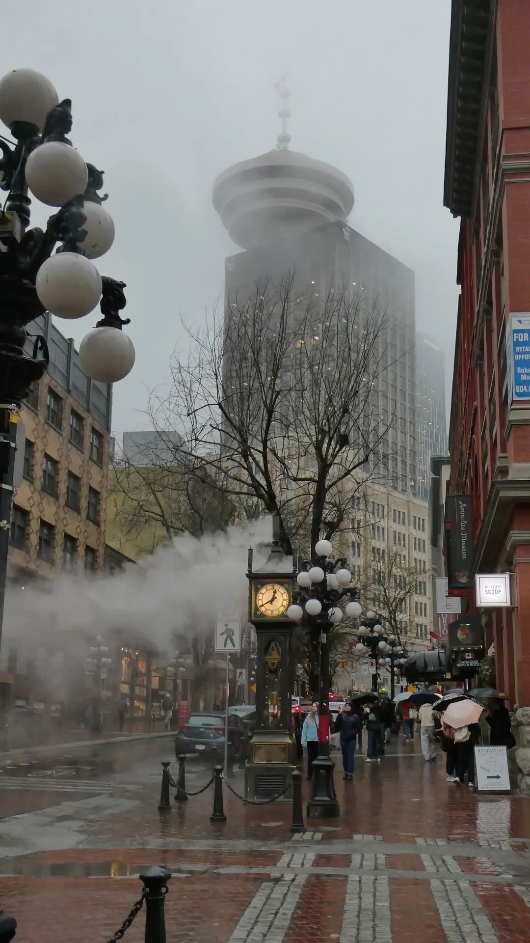 Gastown brick storefronts, cobblestone streets, and street life